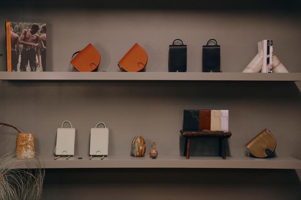 Shelves with leather bags