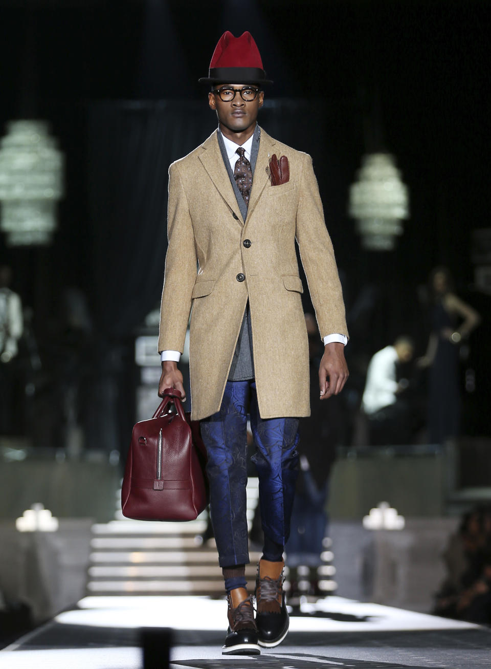 A model wears a creation for DSquared2 men's Fall-Winter 2013-14 collection, part of the Milan Fashion Week, unveiled in Milan, Italy, Tuesday, Jan. 15, 2013. (AP Photo/Antonio Calanni)