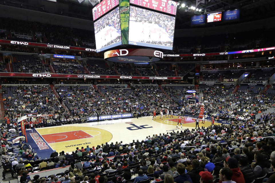 FILE - The New Orleans Pelicans and the Washington Wizards play in an NBA basketball game in Washington, Dec. 19, 2017. The NBA’s Washington Wizards and NHL’s Washington Capitals are staying in the District of Columbia. Owner Ted Leonsis and Mayor Muriel Bowser announced the development at a news conference at Capital One Arena on Wednesday, March 27, 2024. (AP Photo/Mark Tenally, File)