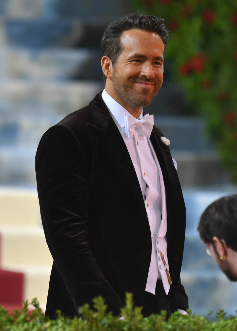 Ryan smiling as he rocks a tux at the Met Gala