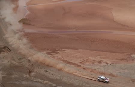 Dakar Rally - 2017 Paraguay-Bolivia-Argentina Dakar rally - 39th Dakar Edition - Fifth stage from Tupiza to Oruro, Bolivia 06/01/17. Sebastien Loeb of France drives his Peugeot with his copilot Daniel Elena. REUTERS/Ricardo Moraes