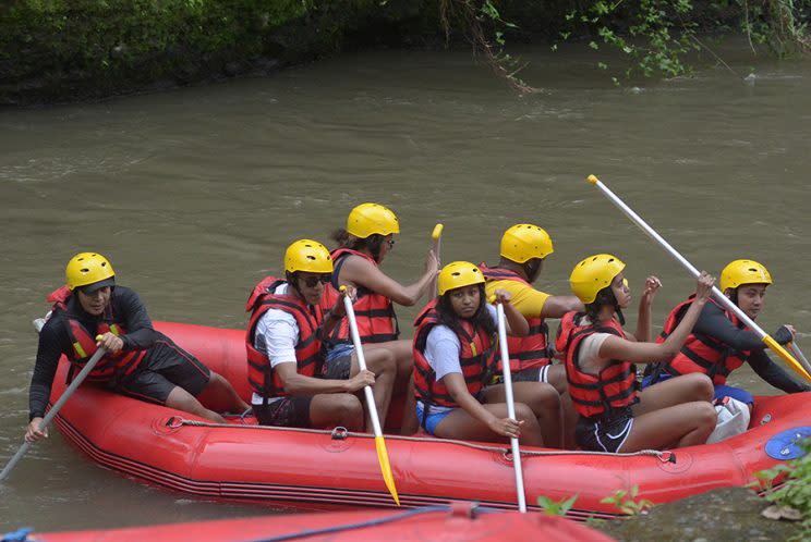 The Obama family whitewater rafting in Bali. (Photo: Getty Images)