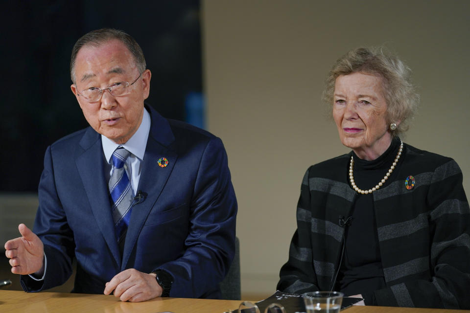 Former United Nations Secretary-General Ban Ki-moon, left, is joined by Mary Robinson as he speaks during an interview with The Associated Press, Friday, Nov. 4, 2022, in New York. (AP Photo/Mary Altaffer)