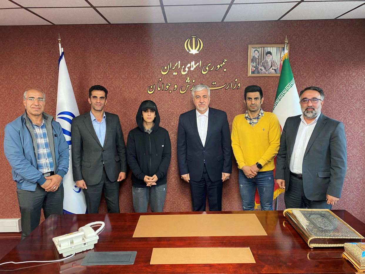 Elnaz Rekabi met with Iranian officials after returning from an international competition. (Office of Iran's Sports Ministry/WANA (West Asia News Agency)