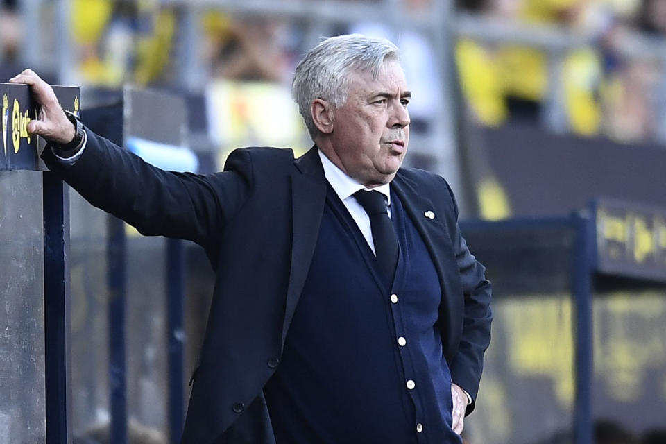 Real Madrid's head coach Carlo Ancelotti watches the Spanish La Liga soccer match between Cadiz and Real Madrid at the Nuevo Mirandilla stadium in Cadiz, Spain, Sunday, May 15, 2022. (AP Photo/Jose Breton)