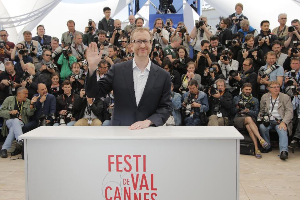 Director James Gray gestures as he poses for photographers during a photo call for the film The Immigrant at the 66th international film festival, in Cannes, southern France, Friday, May 24, 2013. (AP Photo/Francois Mori)