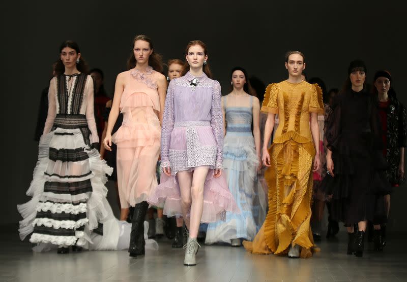 Models display creations during the Bora Aksu show at London Fashion Week