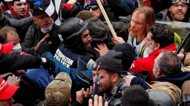 PHOTO: FILE - Pro-Trump protesters clash with D.C. police officer Michael Fanone during a rally to contest the certification of the 2020 U.S. presidential election results by the U.S. Congress, at the U.S. Capitol Building in Washington, U.S, Jan. 6, 2021 (Shannon Stapleton/Reuters, FILE)
