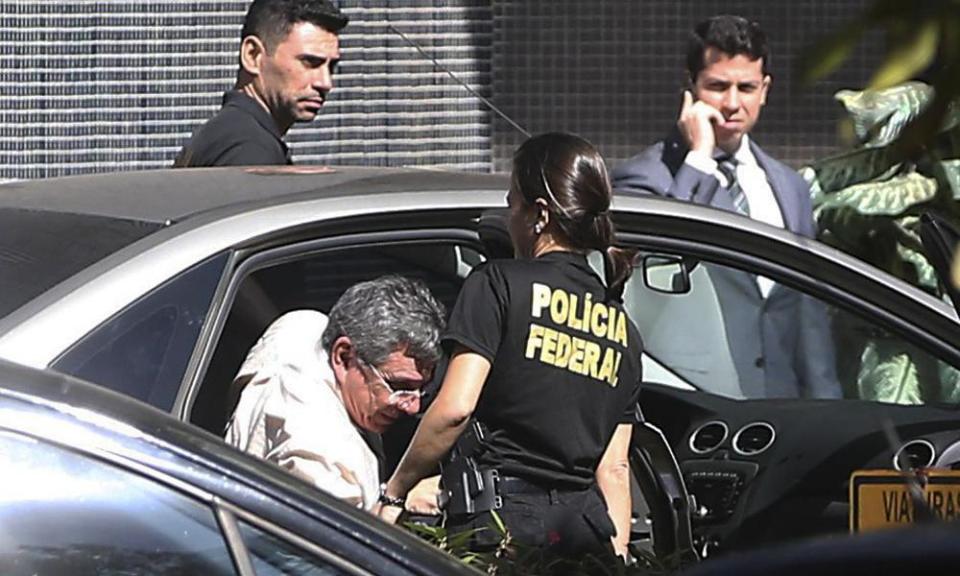 Tadeu Filippelli arrives at federal police headquarters after his arrest in Brasilia, Brazil, Tuesday.