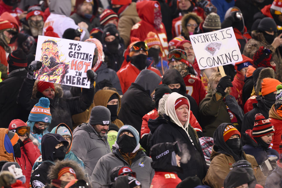 FILE - Kansas City Chiefs fans who braved sub-zero temperatures celebrate after a touchdown against the Miami Dolphins during the first half of an NFL wild-card playoff football game, Saturday, Jan. 13, 2024 in Kansas City, Mo. Some of the people who attended the near-record cold Chiefs playoff game in January had to undergo amputations, a Missouri hospital said Friday, March 8, 2024. Research Medical Center didn’t provide exact numbers but said in a statement Friday that some of the 12 people who had to undergo amputations after the cold snap had been at the game. (AP Photo/Reed Hoffmann, File)