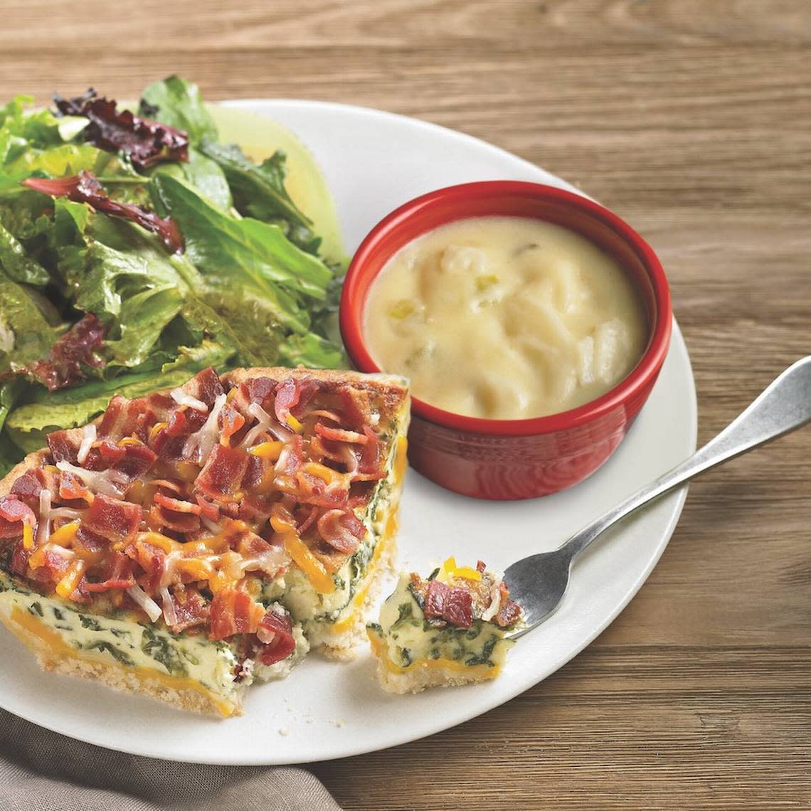 The restaurant offers a pick-three combo for $13.50: a slice of bacon quiche, side salad and a cup of potato cheese soup.