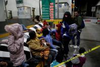 Migrants from Central America block the Paso del Norte border crossing bridge after a U.S. appeals court blocked the Migrant Protection Protocols (MPP) program, in Ciudad Juarez