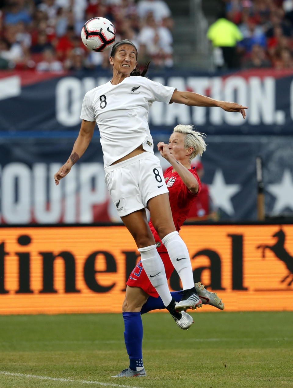 FILE - In this May 16, 2019, file photo, New Zealand's Abby Erceg (8) reaches for the ball as United States' Megan Rapinoe defends during the first half of an international friendly soccer match in St. Louis. Coach Paul Riley calls defender Abby Erceg the bedrock of the North Carolina Courage. The New Zealand native is captain of the Courage, the two-time National Women's Soccer League defending champions. (AP Photo/Jeff Roberson, File)
