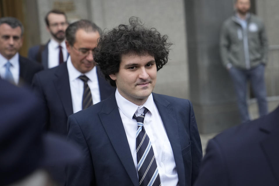 Samuel Bankman-Fried departs Manhattan federal court in New York, Thursday, Feb. 9, 2023, in New York. (AP Photo/John Minchillo)