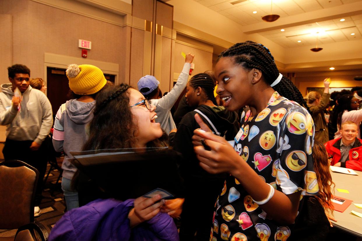 Alanis Aranda, left, and Kyla Chester, greet each other during the ice-breaker portion of an Urban Underground program in 2018.