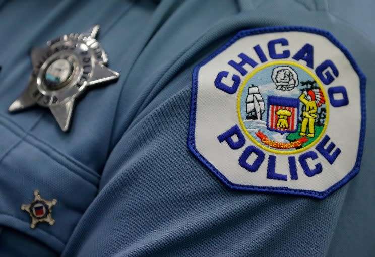 A Chicago police officer attends a news conference announcing the hiring of nearly 1,000 new police officers in Chicago, September 21, 2016.