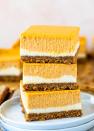 <p>Just look at the gorgeous layers on these pumpkin cheesecake bars. They're bursting with flavor—even the graham cracker crust has pumpkin spice!</p><p><strong>Get the recipe at <a href="https://gimmedelicious.com/pumpkin-cheesecake-bars/" rel="nofollow noopener" target="_blank" data-ylk="slk:Gimme Delicious;elm:context_link;itc:0;sec:content-canvas" class="link ">Gimme Delicious</a>.</strong> </p>