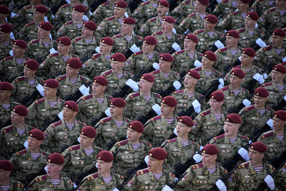 Russian soldiers march toward Red Square to attend a Victory Day military parade in Moscow, Russia, Tuesday, May 9, 2023, marking the 78th anniversary of the end of World War II. (AP Photo/Alexander Zemlianichenko)