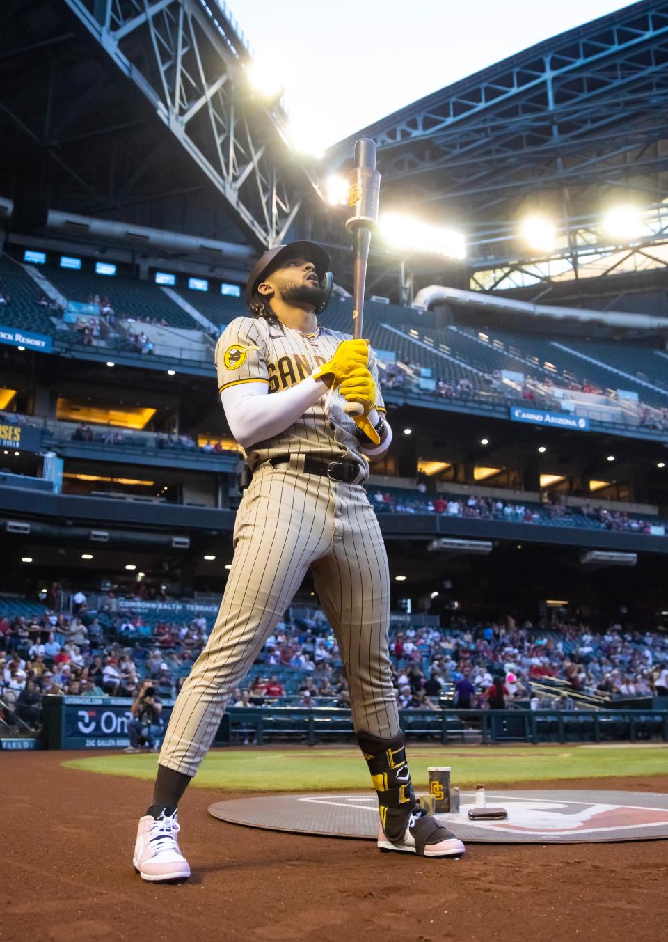 San Diego Padres outfielder Fernando Tatis Jr. prepares to bat in the first inning against the Arizona Diamondbacks at Chase Field.