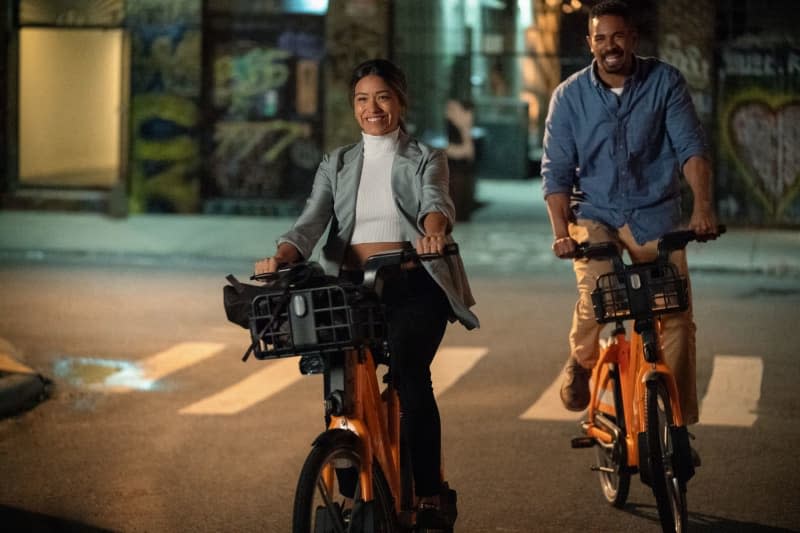 Gina Rodriguez stars as Mack and Damon Wayans as Adam in Netflix's "Players", a rom-com that stays engaging as works its way through its reliable trope: The real Mr. Right was in front of her all along. K.C. Bailey/Netflix/dpa