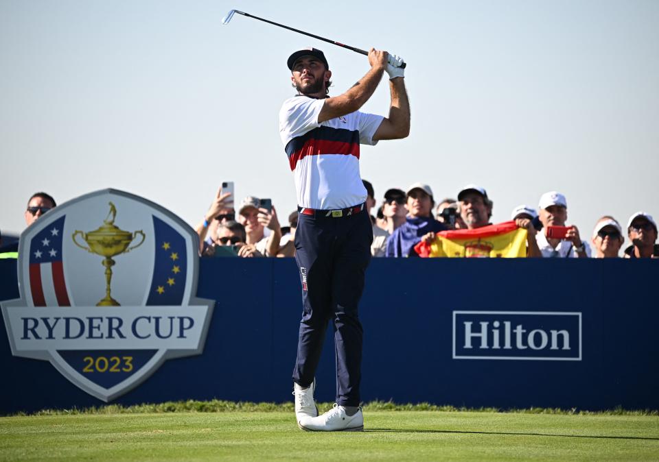 US golfer, Max Homa plays off the 13th tee during his foursomes match on the second day of play in the 44th Ryder Cup at the Marco Simone Golf and Country Club in Rome on September 30, 2023. (Photo by Paul Ellis / AFP)