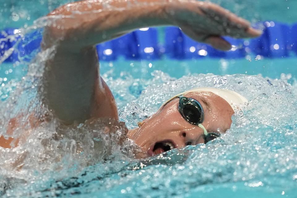 Mariah Denigan swims in the women's 1,500-meter freestyle at the U.S. nationals swimming meet Saturday, July 1, 2023, in Indianapolis. (AP Photo/Darron Cummings)