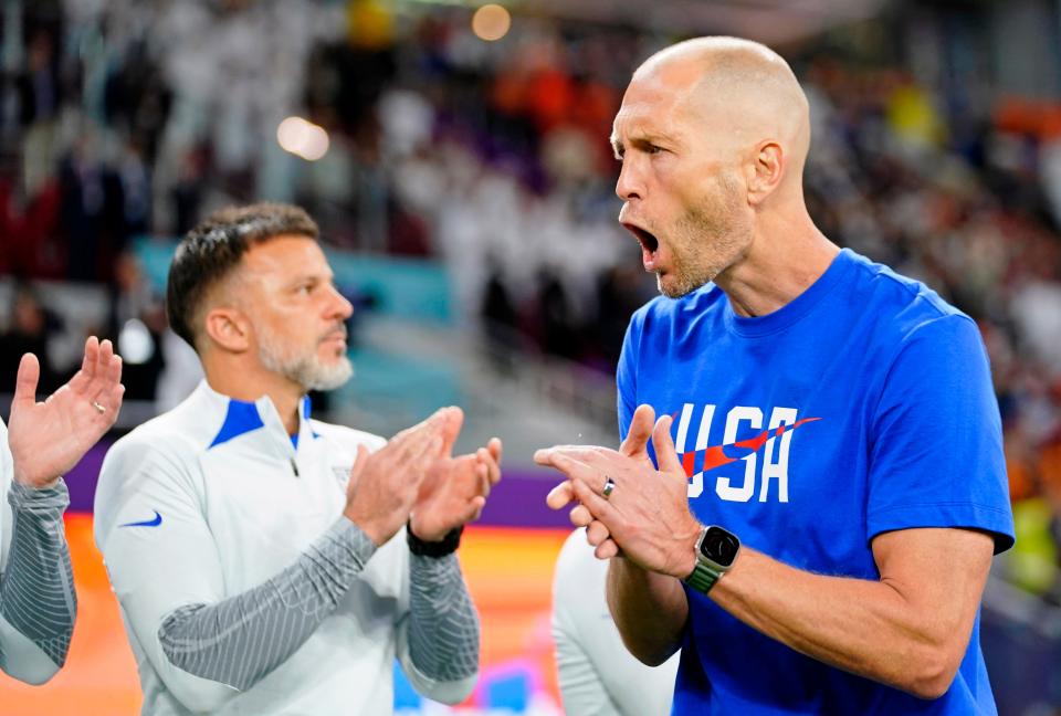 Dec 3, 2022; Al Rayyan, Qatar; United States of America manager Gregg Berhalter reacts after the the national anthem before a round of sixteen match against the Netherlands in the 2022 FIFA World Cup at Khalifa International Stadium.