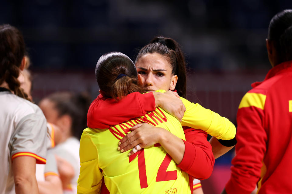 TOKYO, JAPAN - AUGUST 02: Carmen Dolores Martin Berenguer of Team Spain embraces teammate Silvia Navarro Gimenez after losing the Women's Preliminary Round Group B handball match between Spain and ROC on day ten of the Tokyo 2020 Olympic Games at Yoyogi National Stadium on August 02, 2021 in Tokyo, Japan. (Photo by Dean Mouhtaropoulos/Getty Images)