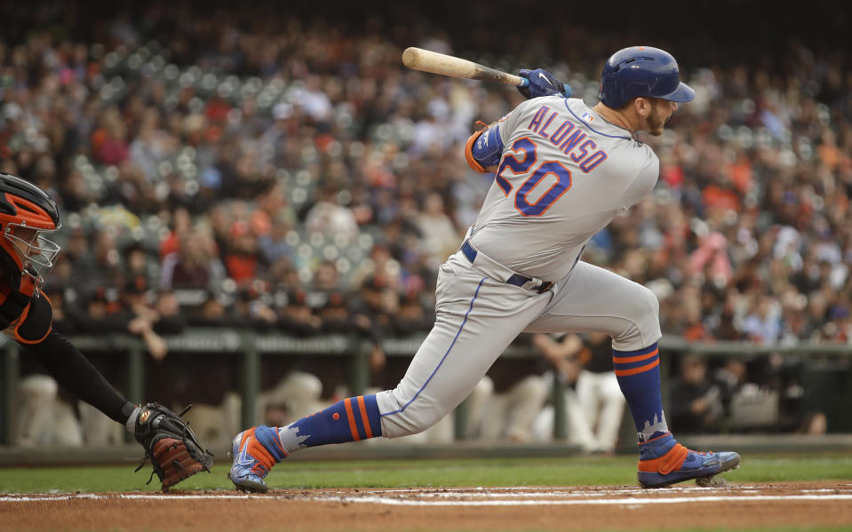 New York Mets' Pete Alonso grounds into a double play against San Francisco Giants' Madison Bumgarner, but drives in a run during the first inning of a baseball game Thursday, July 18, 2019, in San Francisco. (AP Photo/Ben Margot)