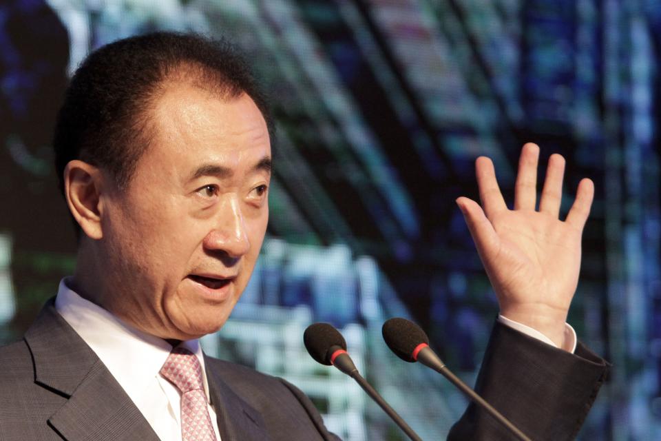 Copyright 2016 The Associated Press. All rights reserved. This material may not be published, broadcast, rewritten or redistributed without permission. Mandatory Credit: Photo by Gerry Shih/AP/REX/Shutterstock (5768317a) Wang Jianlin, left, chairman of Wanda Group, gestures as he speaks during a ceremony for the "China Cup" at the Sofitel Hotel in Beijing China Cup ceremony, Beijing, China - 13 Jul 2016 Chinese real estate, entertainment and sports conglomerate Wanda says it will host an annual "China Cup" football tournament which will begin next year and feature four national teams.