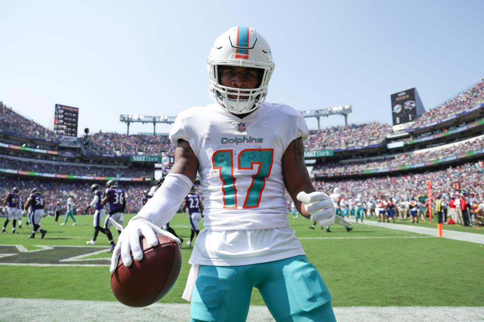 BALTIMORE, MARYLAND - SEPTEMBER 18: Wide receiver Jaylen Waddle #17 of the Miami Dolphins celebrates after catching a first half touchdown pass against the Baltimore Ravens at M&T Bank Stadium on September 18, 2022 in Baltimore, Maryland. (Photo by Rob Carr/Getty Images)