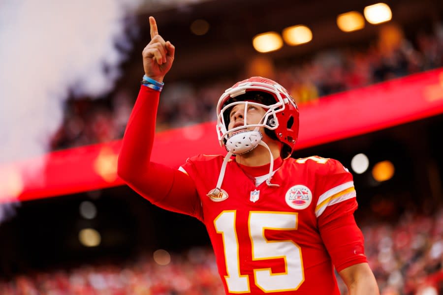 KANSAS CITY, MISSOURI – DECEMBER 31: Patrick Mahomes #15 of the Kansas City Chiefs runs onto the field during player introductions before an NFL football game against the Cincinnati Bengals at GEHA Field at Arrowhead Stadium on December 31, 2023 in Kansas City, Missouri. (Photo by Ryan Kang/Getty Images)