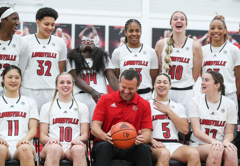 The Louisville's women's basketball team laughs during the team portrait on Media Day. Oct. 27. Oct. 27, 2022. 