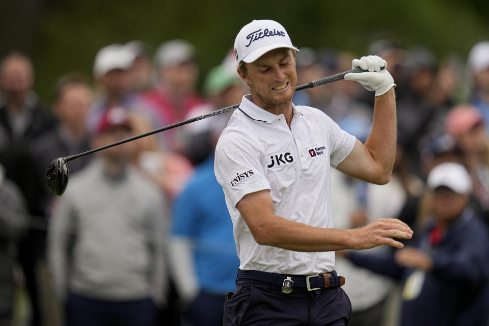 Will Zalatoris watches his tee shot on the 16th hole during the third round of the PGA Championship golf tournament at Southern Hills Country Club, Saturday, May 21, 2022, in Tulsa, Okla. (AP Photo/Sue Ogrocki)