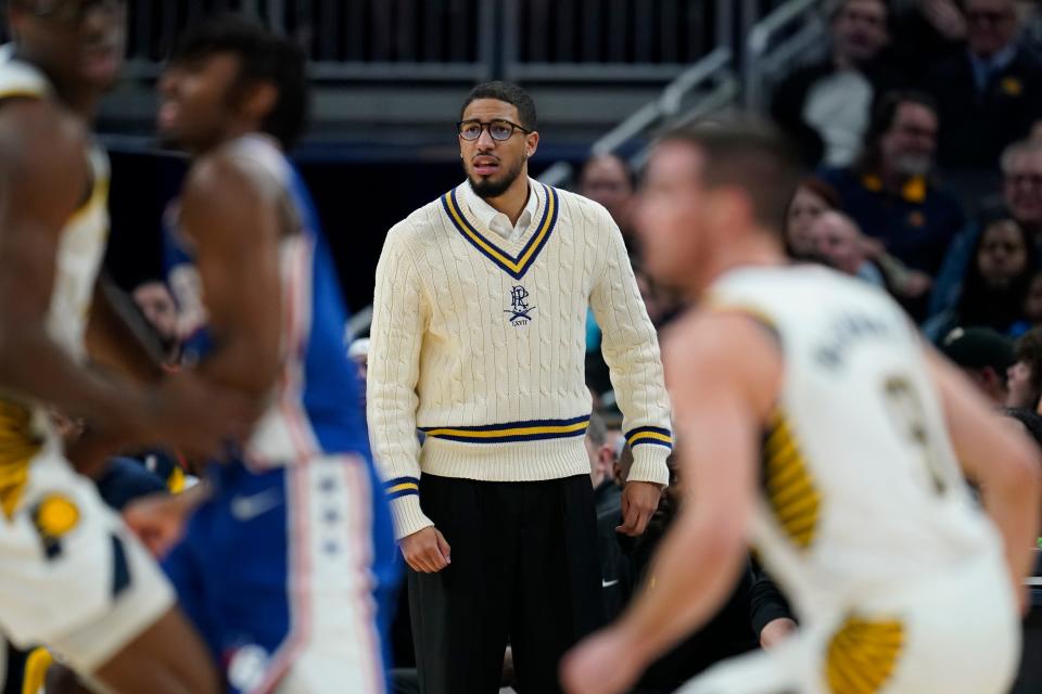 Indiana Pacers' Tyrese Haliburton watches during the first half of the team's NBA basketball game against the Philadelphia 76ers, Thursday, Jan. 25, 2024, in Indianapolis. (AP Photo/Darron Cummings)