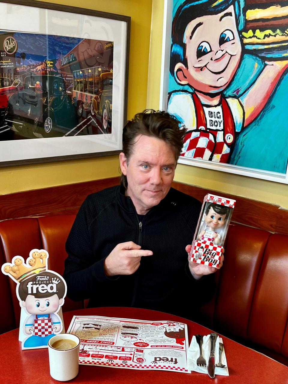 Funko founder Mike Becker with the company's first toy, a Wacky Wobbler figure of the Bob's Big Boy character. He was at the the historical Bob’s Big Boy restaurant in Burbank, Calif., for a launch event for Funko's Project Fred line of premium figures.