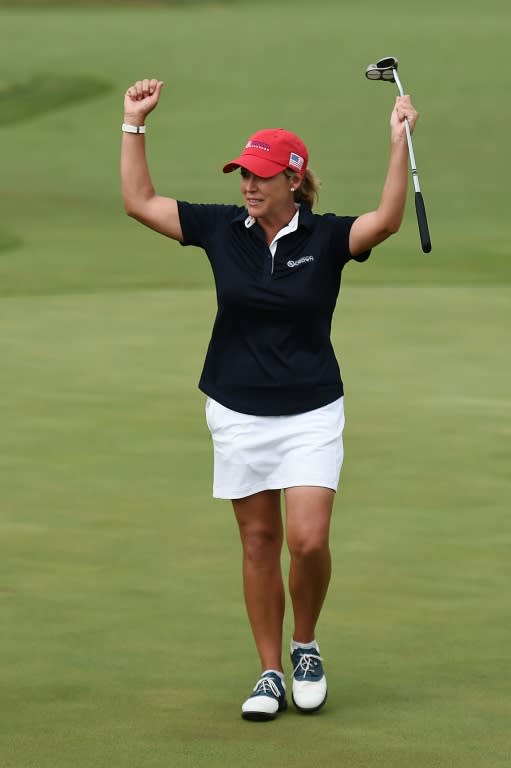 Cristie Kerr of the US celebrates after defeating Japan on the 16th hole 4&2 during the four-ball session of the 2016 UL International Crown, at the Merit Club in Chicago, Illinois, on July 23