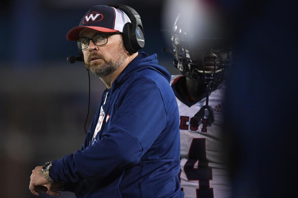 West head coach Lamar Brown was named Tennessee Titans High School Coach of the Year after leading the Rebels to an undefeated season. “I am thrilled to death for the players and the coaches. They put in so much time.”