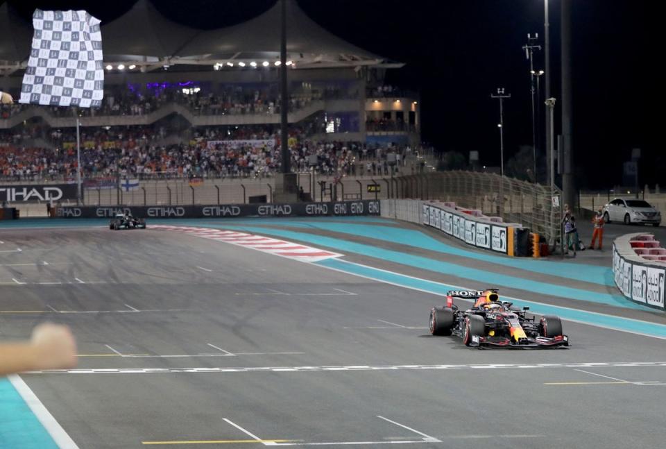 Verstappen takes the chequered flag ahead of Hamilton (POOL/AFP via Getty Images)