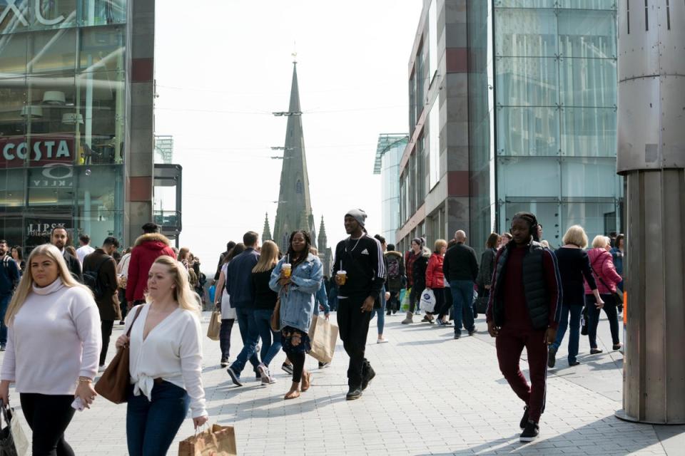 Shoppers in Birmingham (Alamy/PA)