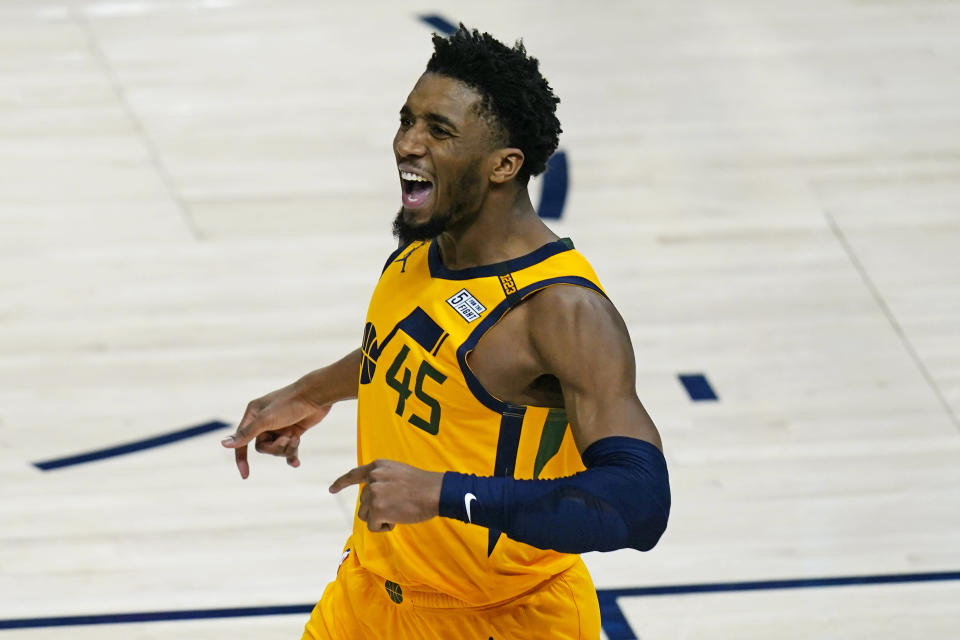 Utah Jazz guard Donovan Mitchell (45) reacts after scoring against the Charlotte Hornets in the second half during an NBA basketball game Monday, Feb. 22, 2021, in Salt Lake City. (AP Photo/Rick Bowmer)