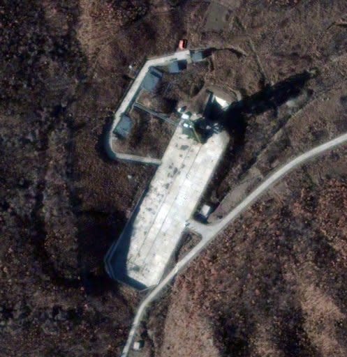 Satellite image courtesy of DigitalGlobe shows North Korea's Sohae Satellite Launch Station on November 26. North Korea has installed the first stage of a long-range rocket it plans to launch this month on the launch pad, defying international calls to cancel the mission, a report said Monday