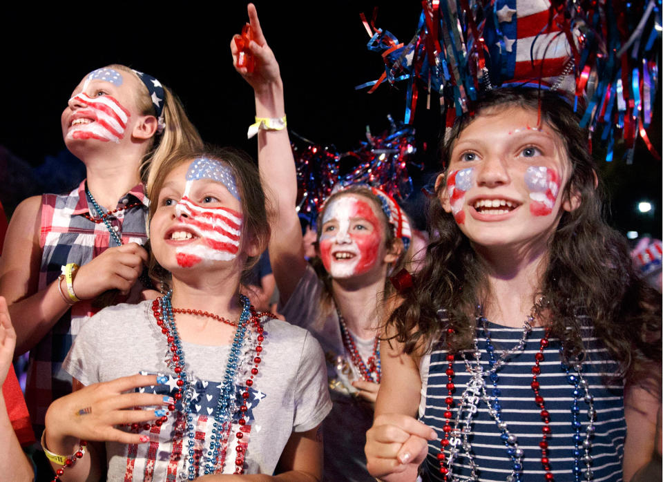 <p>Children sing along during a rehearsal for the annual Boston Pops Fireworks Spectacular on the Esplanade, Monday, July 3, 2017, in Boston, Mass. (Photo: Michael Dwyer/AP) </p>