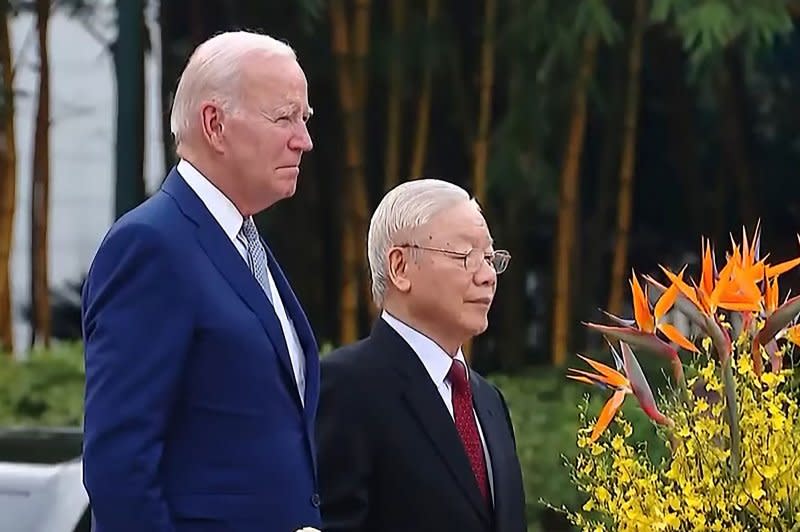 U.S. President Joe Biden attends a welcoming ceremony hosted by Vietnam's Communist Party General Secretary Nguyen Phu Trong (R) at the Presidential Palace of Vietnam in Hanoi on Sunday. Photo by VTV24/UPI