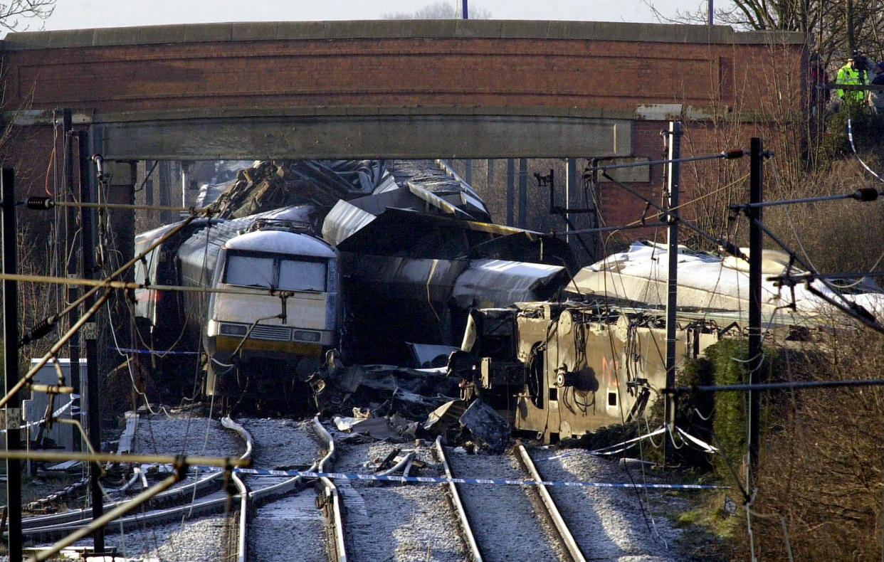 The scene at Great Heck near Selby, North Yorkshie, where rescue workers are recovering more bodies from the tangled wreckage of yesterdays train disaster. Heavy lifting gear is being brought in to start removing the twisted carriages 24 hours after the horrific crash  * ... that killed 13 people and injured 70.  28/11/01: The trial of Gary Hart is starting at Leeds Crown Court, where he faces faces 10 counts of causing death by dangerous driving.  The crash happened after Hart's Land Rover left the carriageway of the M62 motorway, plunged down an embankment and came to rest on the main Newcastle to London railway line.   The vehicle was then hit by an express passenger train which then collided with a freight train heading in the opposite direction.  11/1/02: the Land Rover at the scence of the train crash at Great Heck, near Selby. Gary Hart, from Strubby, Lincolnshire who is due to be sentenced at Leeds Crown Court, after he was found guilty of causing the deaths of 10 men in the Selby train crash. The jury decided he had fallen asleep at the wheel of his Land Rover before it plunged off the M62 and onto the main East Coast railway line on February 28 last year near the North Yorkshire village of Great Heck.  11/01/02 Gary Hart, the driver convicted of causing the deaths of 10 people in the Selby rail crash, was jailed for five years at Leeds Crown Court Friday January 11, 2002.   (Photo by John Giles - PA Images/PA Images via Getty Images)