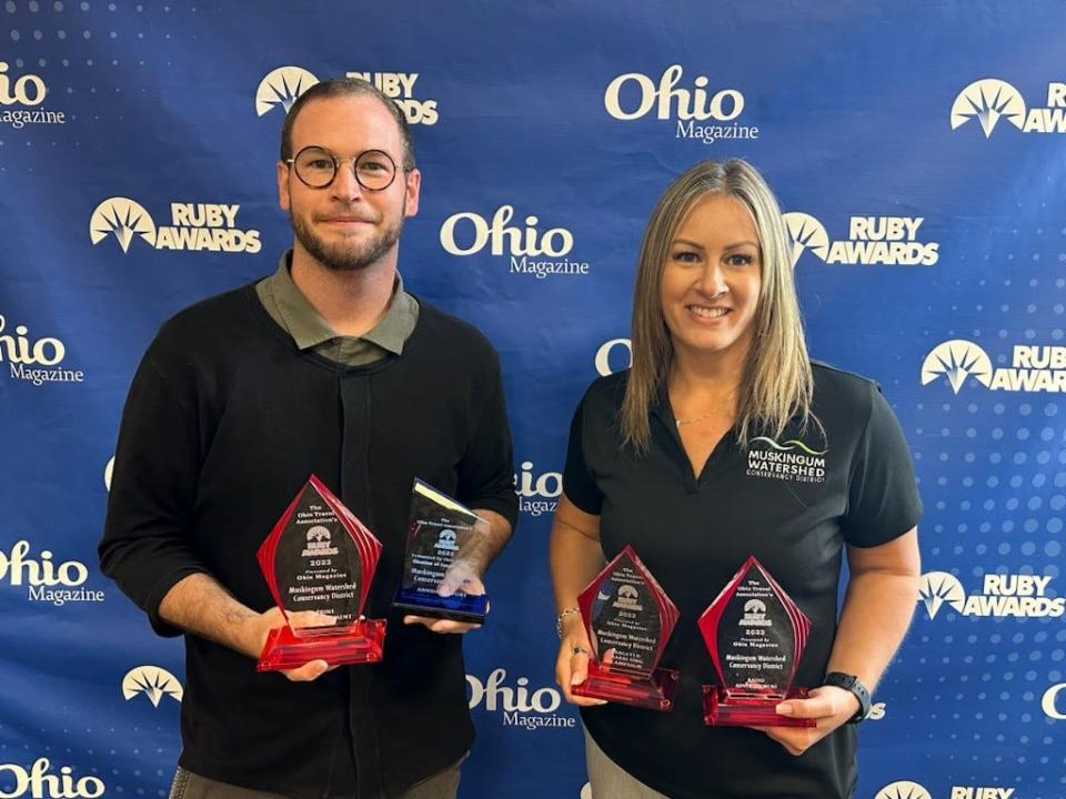 Accepting the Ohio Travel Association's RUBY awards for the Muskingum Watershed Conservancy District were, from left, Logan Phillips, digital media coordinator, and Adria Bergeron, director of marketing and communications.