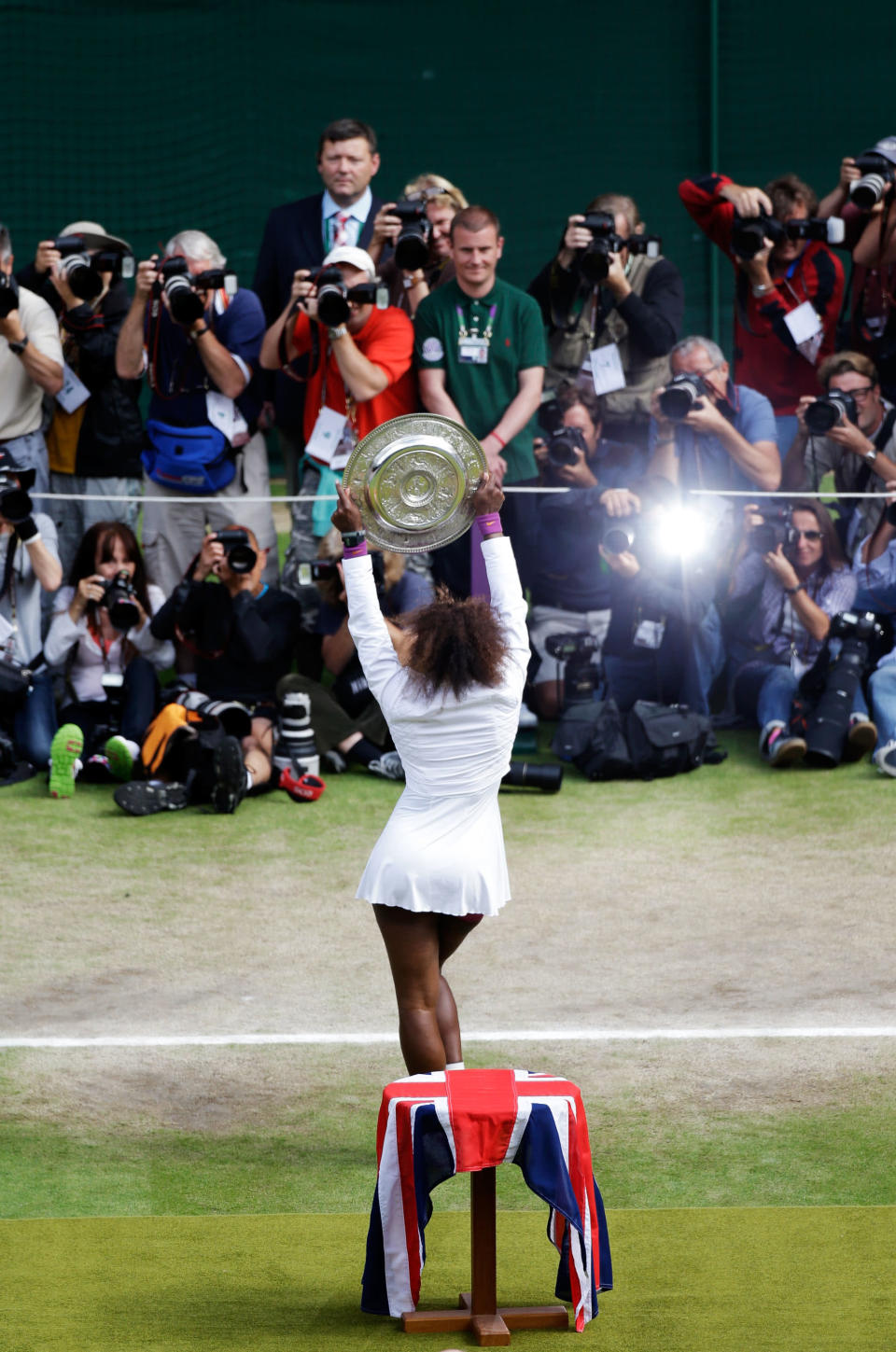 Serena Williams of the USA lifts the winners trophy and celebrates after her Ladies Singles final match against Agnieszka Radwanska of Poland on day twelve of the Wimbledon Lawn Tennis Championships at the All England Lawn Tennis and Croquet Club on July 7, 2012 in London, England. (Photo by Anja Niedringhaus/Pool/Getty Images)