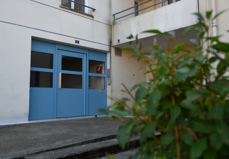 The entrance of houses from the neighbourhood where police picked up a second couple overnight in Chalette sur Loing, the day after several gas cylinders were found in a car near Paris's Notre Dame cathedral