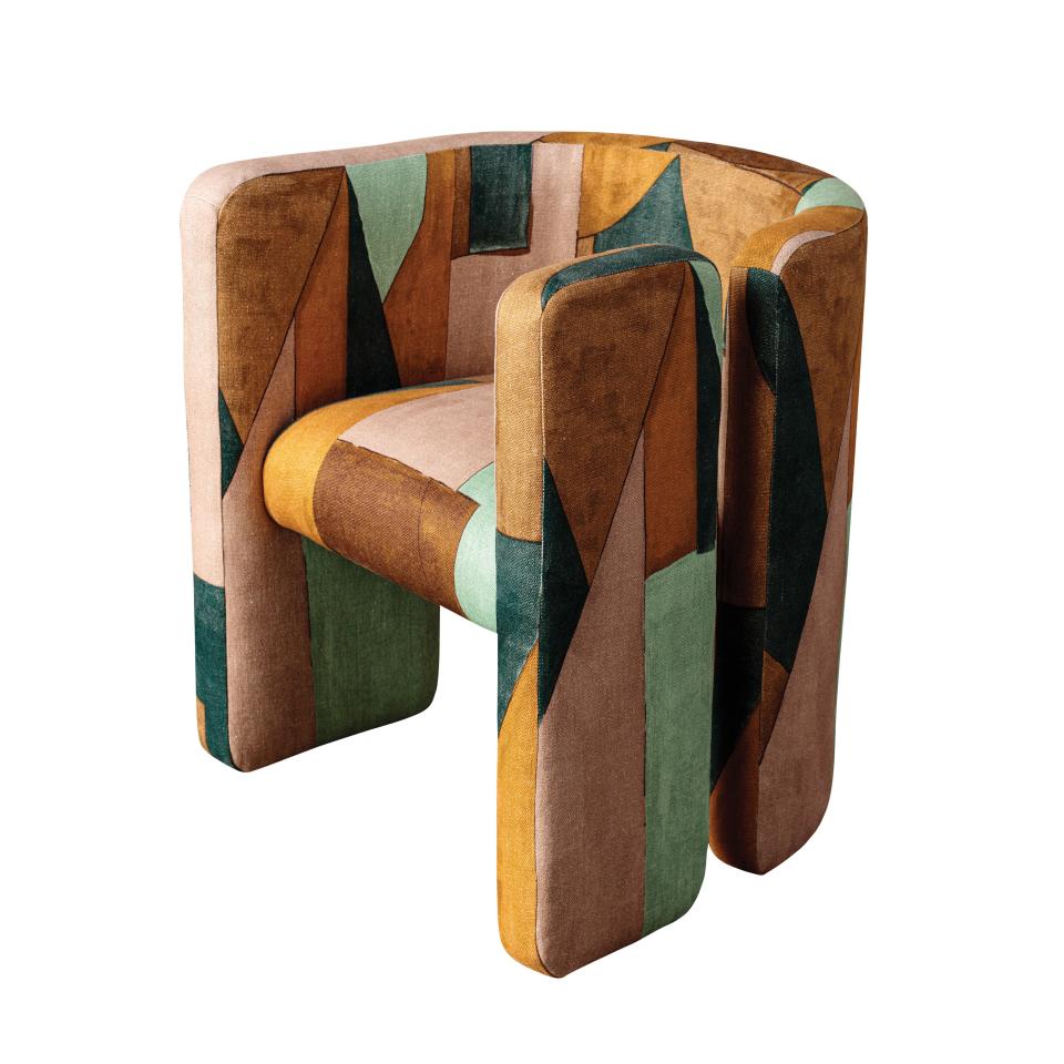 Fairfax chair by Wearstler covered in District fabric for Lee Jofa.