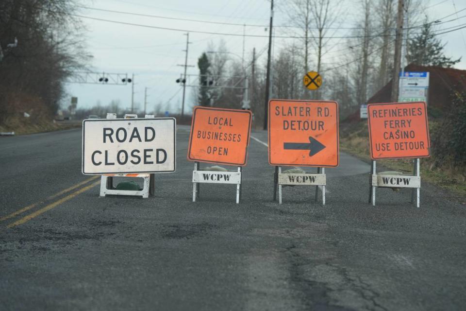 Whatcom County Public Works signs indicate a closure of Slater Road on January 29, 2024, near Ferndale, Wash.